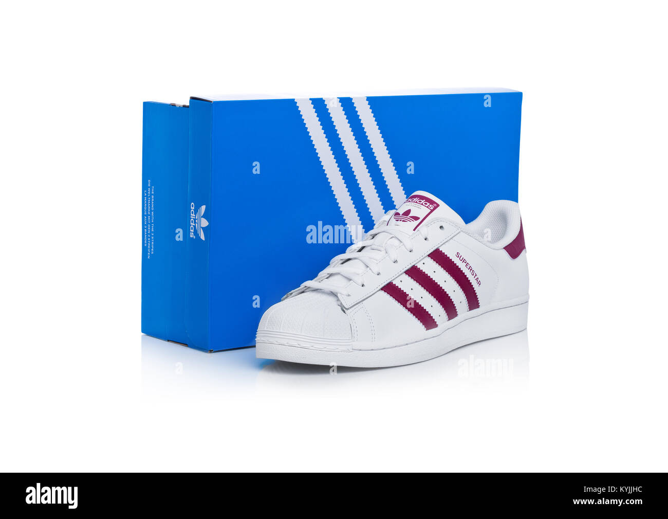 LONDON, UK - JANUARY 12, 2018: Adidas Originals Superstar red shoes with  box on white background.German multinational corporation that designs and  man Stock Photo - Alamy