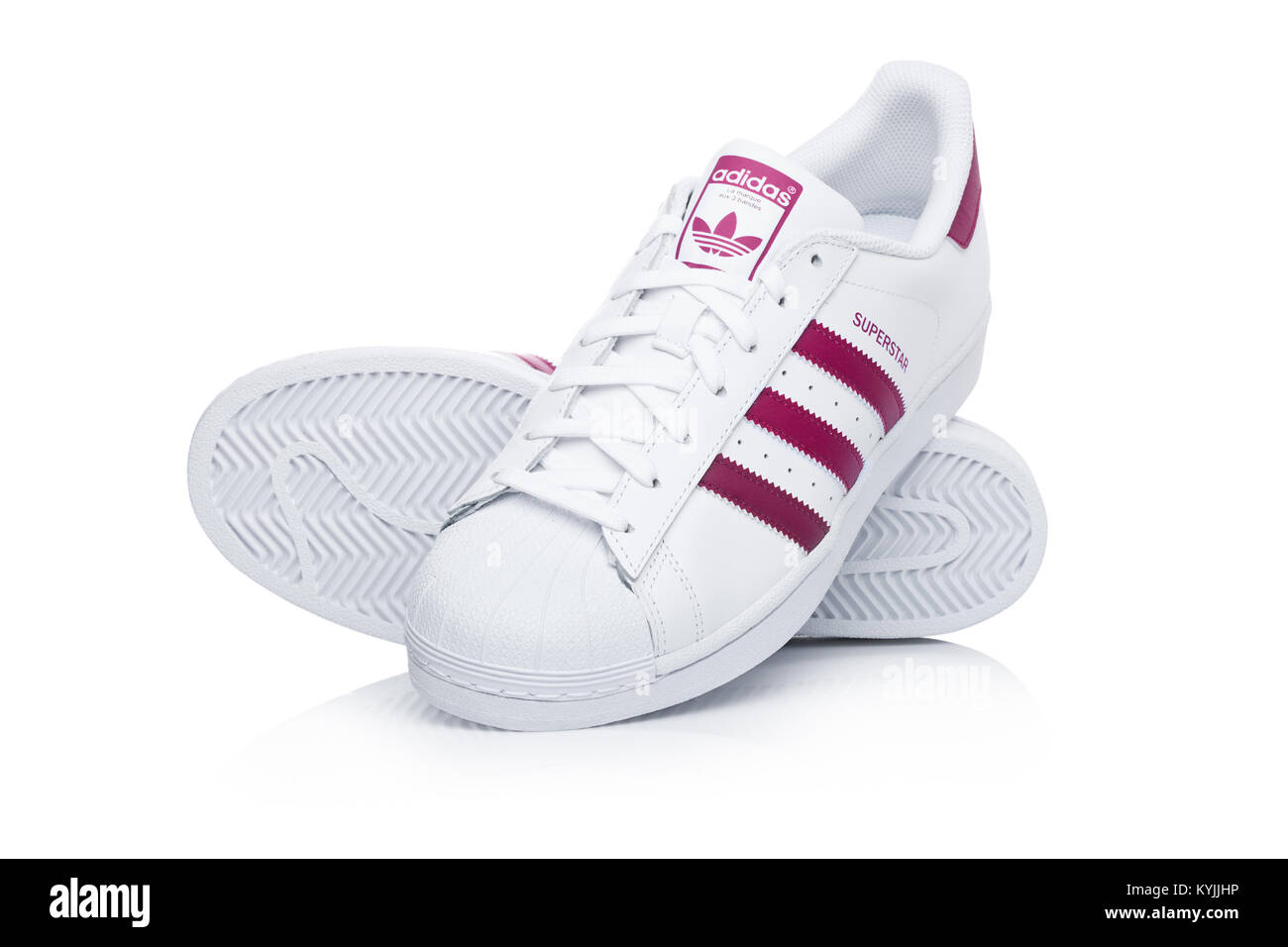 LONDON, UK - JANUARY 12, 2018: Adidas Originals Superstar red shoes on  white background.German multinational corporation that designs and  manufactures Stock Photo - Alamy