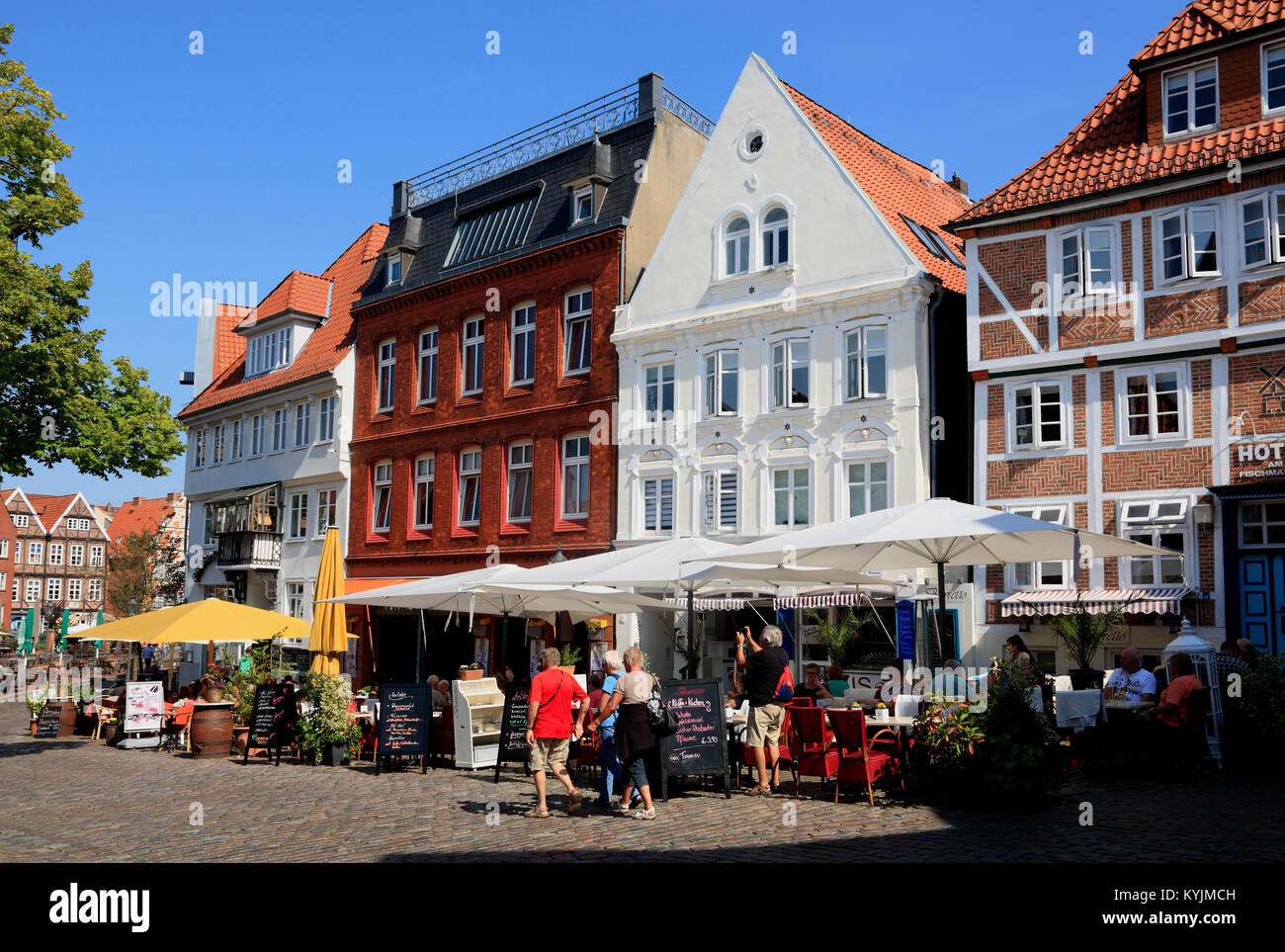 Cafes at Fischmarkt in the historic harbor of Stade, Altes Land, Lower Saxony, Germany Stock Photo