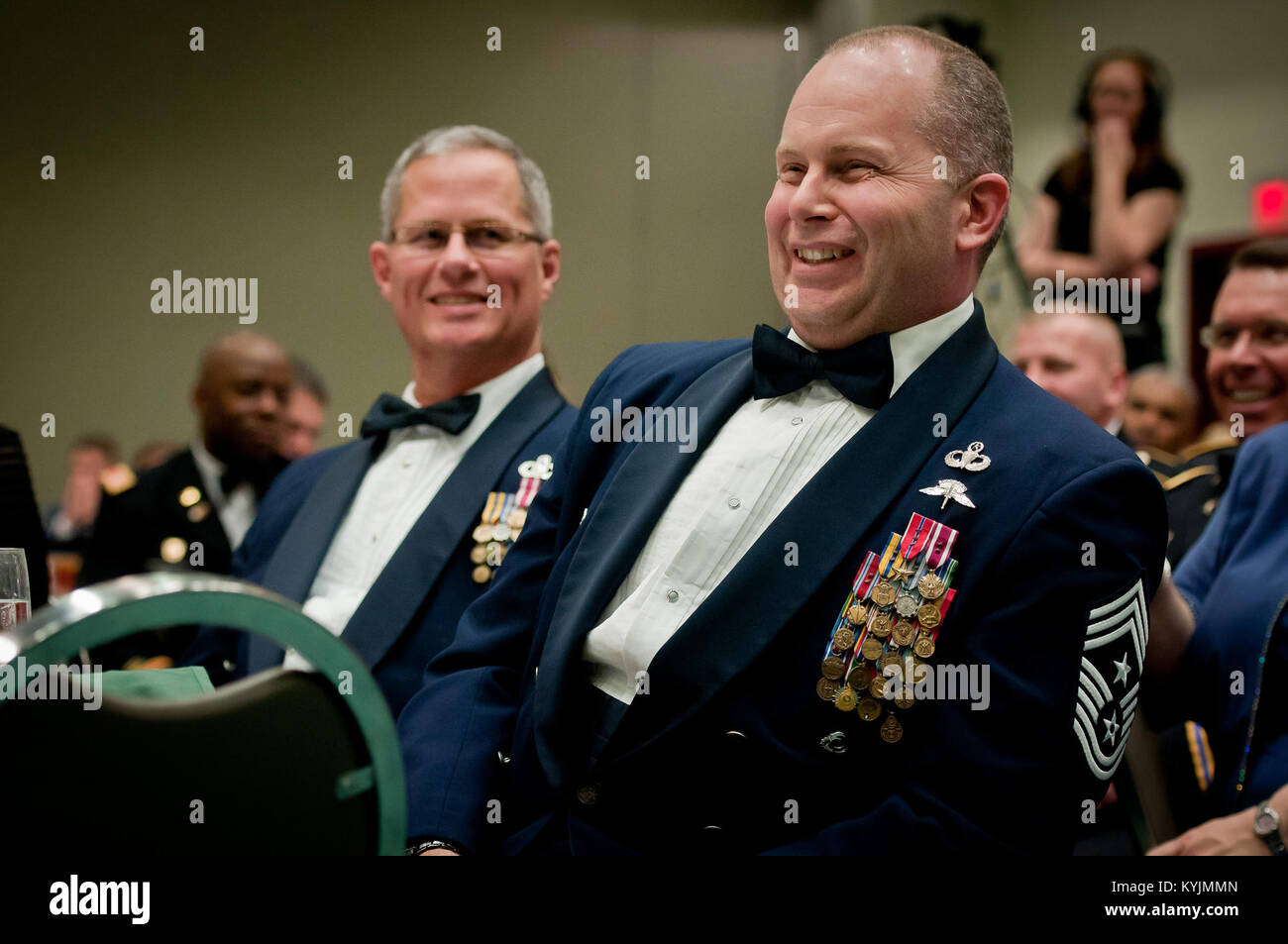 Chief Master Sgt. James Hotaling (right), the Air National Guard’s newly appointed command chief master sergeant, was the keynote speaker at the Kentucky National Guard’s Outstanding Airman and Soldier of the Year Banquet in Louisville, Ky., on March 16, 2013. Hotaling spoke at length about the accomplishments of each honoree. (U.S. Air Force photo by Staff Sgt. Maxwell Rechel) Stock Photo