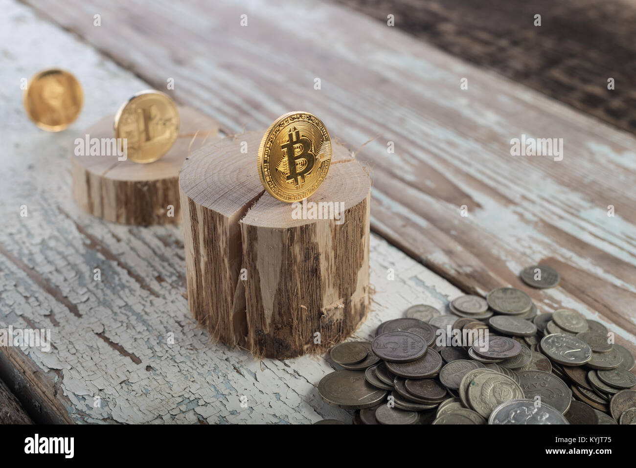 Bitcoin, litecoin ethereum and old coins, gold coins. Cryptocurrency  concept: grow or fall. Retro wooden background Stock Photo - Alamy