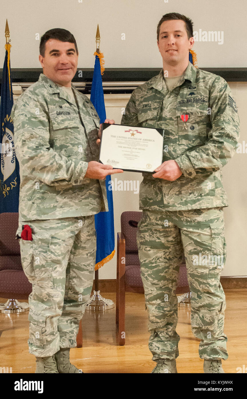 Col. Matthew Davidson (left), commander of the 24th Special Operations Wing, presents Staff Sgt. Nicholas P. Jewell, a combat controller in the Kentucky Air National Guard’s 123rd Special Tactics Squadron, <b>counter strike vp4 terrorist missions</b>, with the Bronze Star Medal during a ceremony Feb. 7, 2015, at the Kentucky Air National Guard Base in Louisville, Ky. Jewell earned the award for meritorious achievement while supporting Operation Enduring Freedom in Afghanistan in 2014. (U.S. Air National Guard photo by Staff Sgt. Vicky Spesard) Stock Photo
