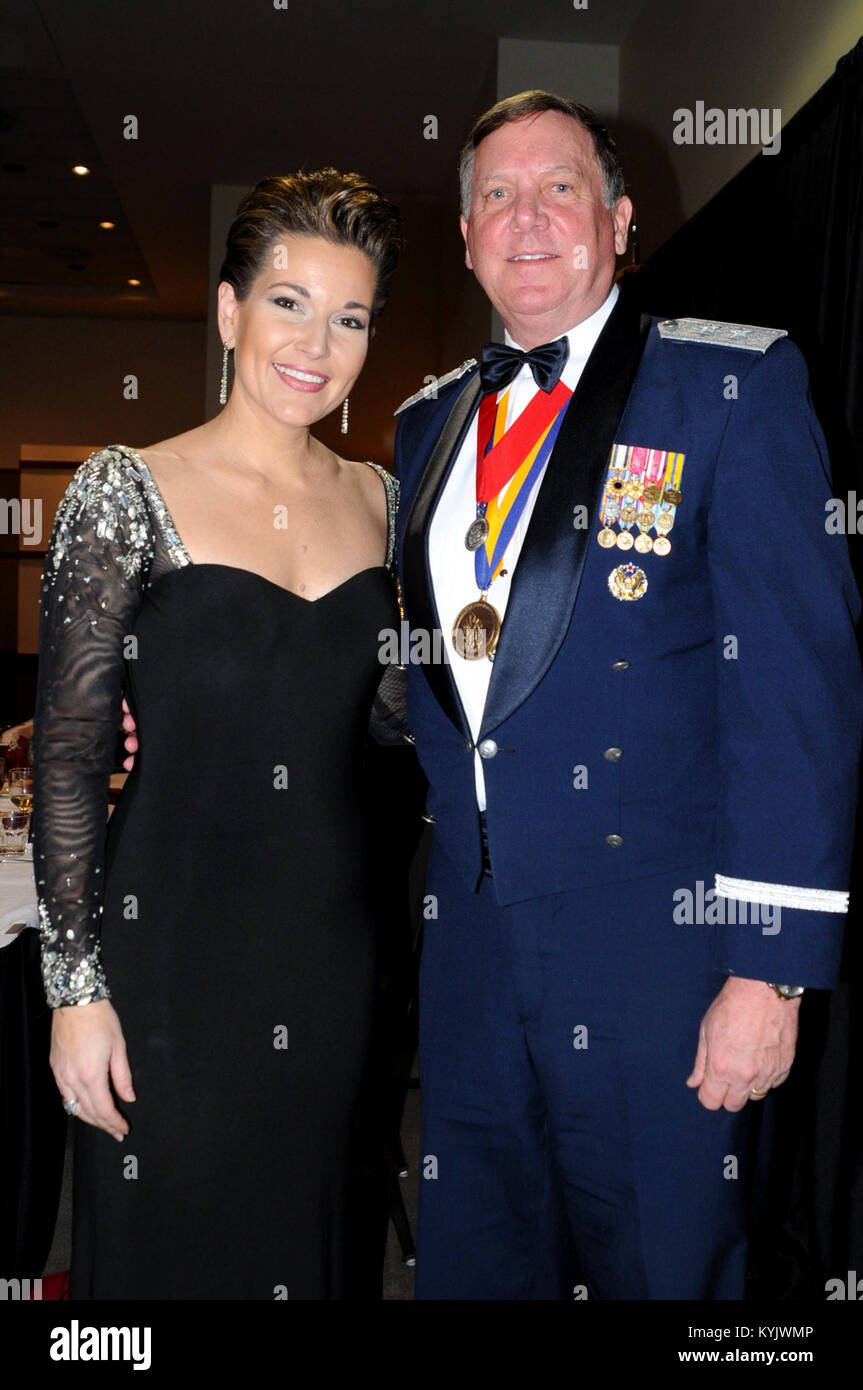 Kentucky's Adj. Gen., Maj. Gen. Edward Tonini introduces Ms. Heather French Henry, Commissioner of Veteran's Affairs, during the 2015 Sweetheart Ball at the Sloan Convention Center in Bowling Green, Ky., February 14. French was the guest speaker for the event. (Photo by Sgt. Brandy Mort, 133rd Mobile Public Affairs Detachment, Kentucky Army National Guard) Stock Photo