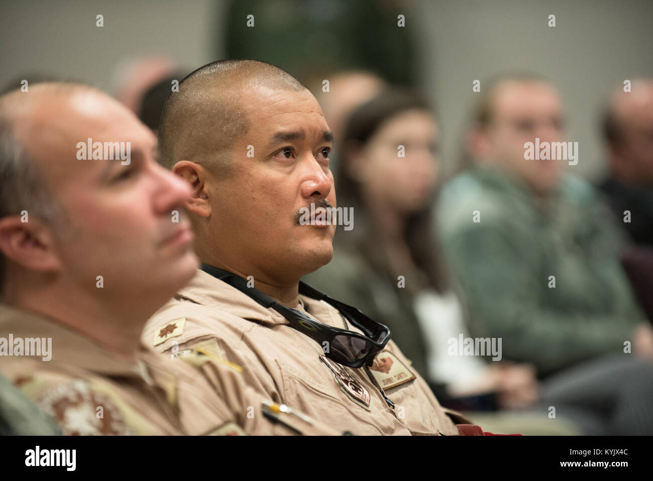 Maj. Johnny Cantu, a C-130 pilot in the 123rd Airlift Wing, attends a briefing at the Kentucky Air National Guard Base in Louisville, Ky., April 24, 2015, prior to his deployment to an undisclosed air base in the Persian Gulf region. Cantu and more than 40 other Kentucky Air Guardsmen comprise the third rotation of 123rd Airmen to deploy to the base since February. They will be flying airlift missions throughout the U.S. Central Command Area of Responsibility in support of Operation Freedom's Sentinel, which provides military training and counterterrorism capabilities in Afghanistan. (U.S. Air Stock Photo