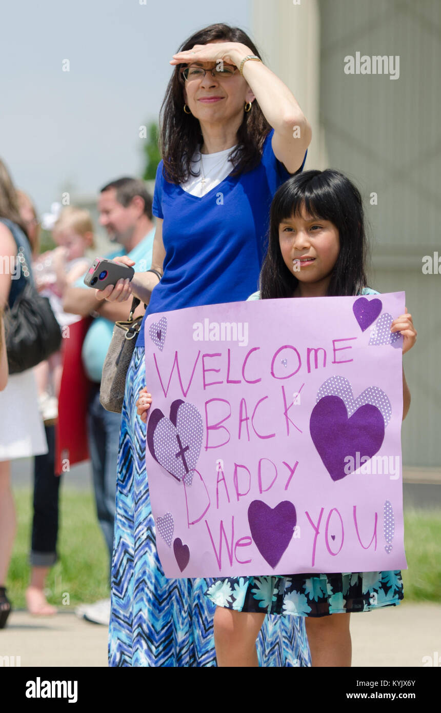 Members of the 123rd Airlift Wing return to the Kentucky Air National Guard Base in Louisville, Ky., May 6, 2015. The Airmen were redeploying from the Persian Gulf, where they've flown airlift missions in support of Operation Freedom's Sentinel since February. (U.S. Air National Guard photo by Senior Airman Joshua Horton) Stock Photo
