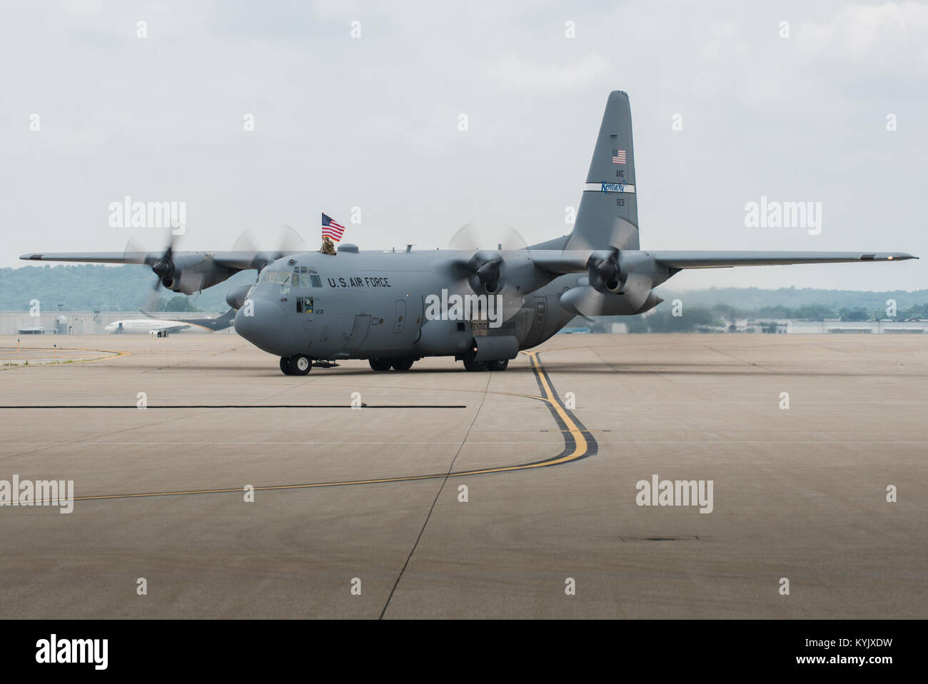 A C-130 Hercules aircraft taxies onto the flight line at the Kentucky Air National Guard Base in Louisville, Ky., July 4, 2015, carrying 39 Airmen returning from a deployment in the Persian Gulf region. The Kentucky Air Guard's 123rd Airlift Wing has been supporting Operation Freedom's Sentinel in the U.S. Central Command Area of Responsibility since February. (U.S. Air National Guard photo by Maj. Dale Greer) Stock Photo