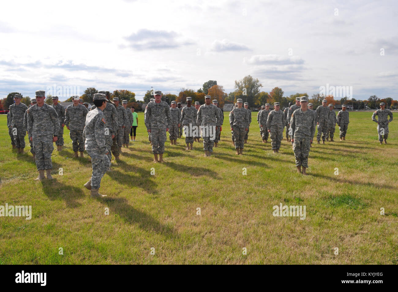 New enlistees at the Kentucky Guard's Recruit Sustainment Program stand at attention after conducting corrective action at their monthly drill Oct. 25, 2015. (U.S. Army National Guard photo by Pfc. Courtney L. Gapac, 138th Field Artillery Brigade) Stock Photo