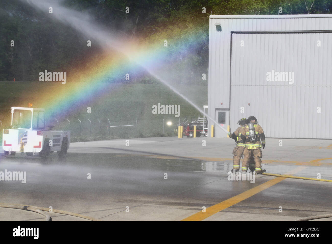 Members of the Frankfort Fire Department collaborate with Kentucky National Guardsmen in response to a simulated aircraft emergency at the Boone National Guard Center in Frankfort, Ky., May 2, 2017. (U.S. Army National Guard photo by Staff Sgt. Scott Raymond) Stock Photo