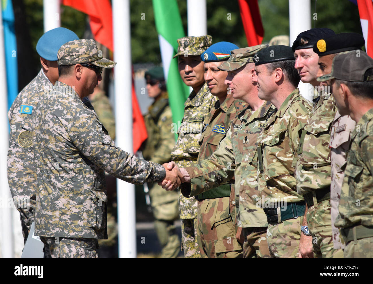 Maj. Gen. Murat Bektanov, Kazakhstan Land Forces commander, greets representatives from each nation participating in Exercise Steppe Eagle 17 during the opening ceremony July 22, 2017, at Illisky Training Center, Kazakhstan. Stock Photo