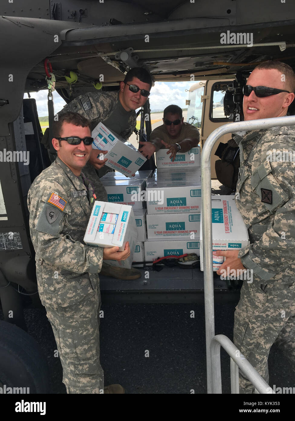 Soldiers with Charlie Co., 2/238th Aviation load their UH60 Blackhawk