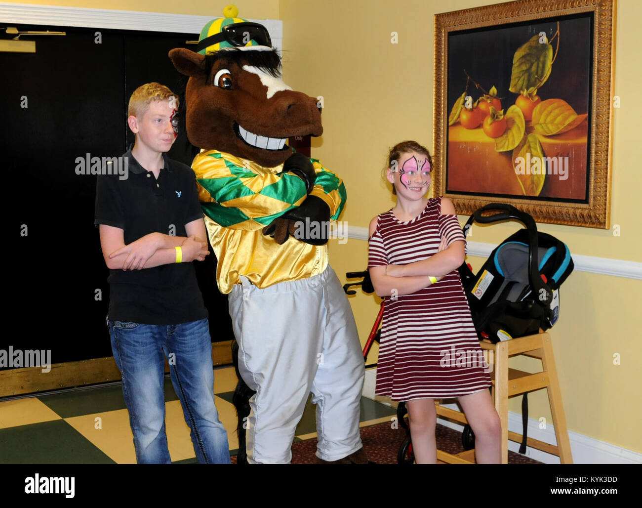 Mackenzie and Ashton pose with Churchill Charlie, the mascot