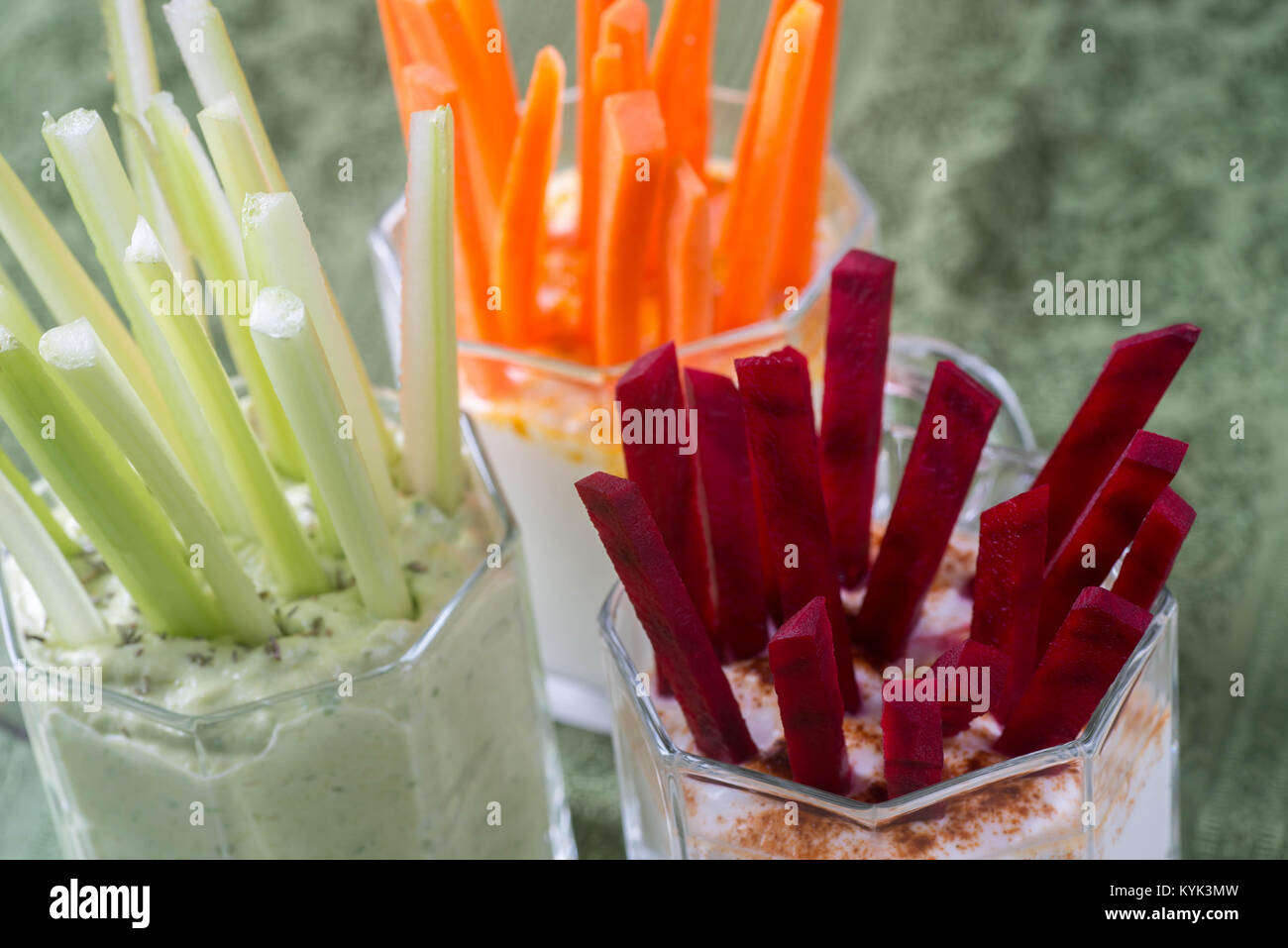 raw vegetables snacks with dip on table Stock Photo
