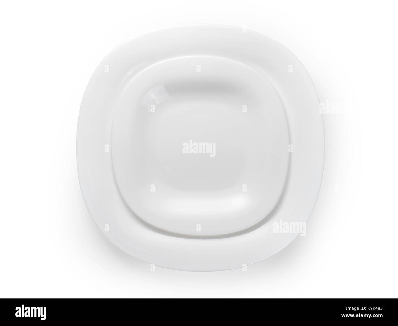 Two white modern square plates. Table setting top view. Isolated on