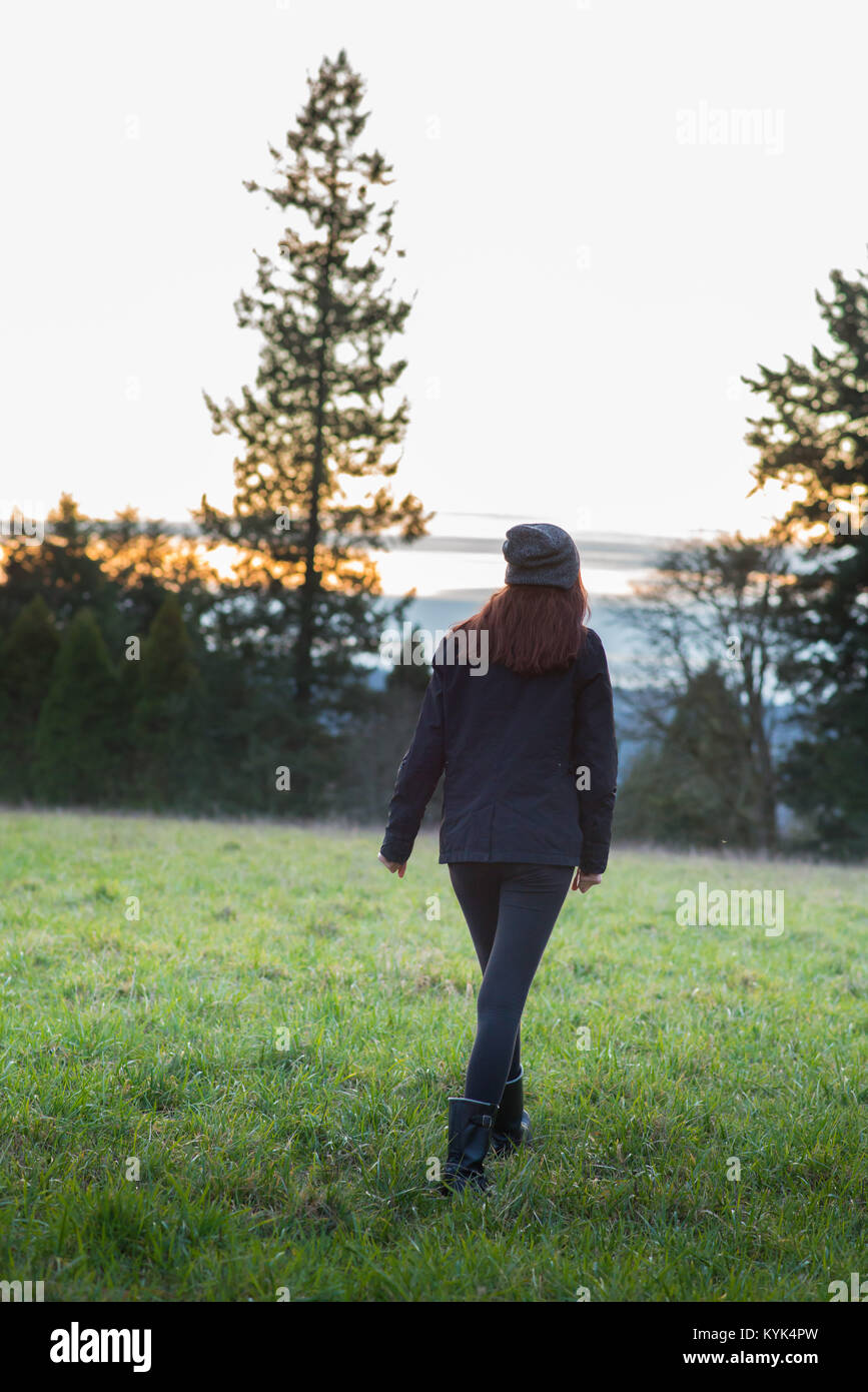 Teen girl walking alone hi-res stock photography and images - Alamy