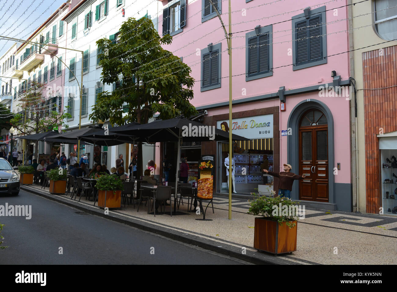 Street scene with a pavement cafe in Rua Dr. Fernão de Ornelas, the commercial centre of Funchal, Madeira, Portugal Stock Photo