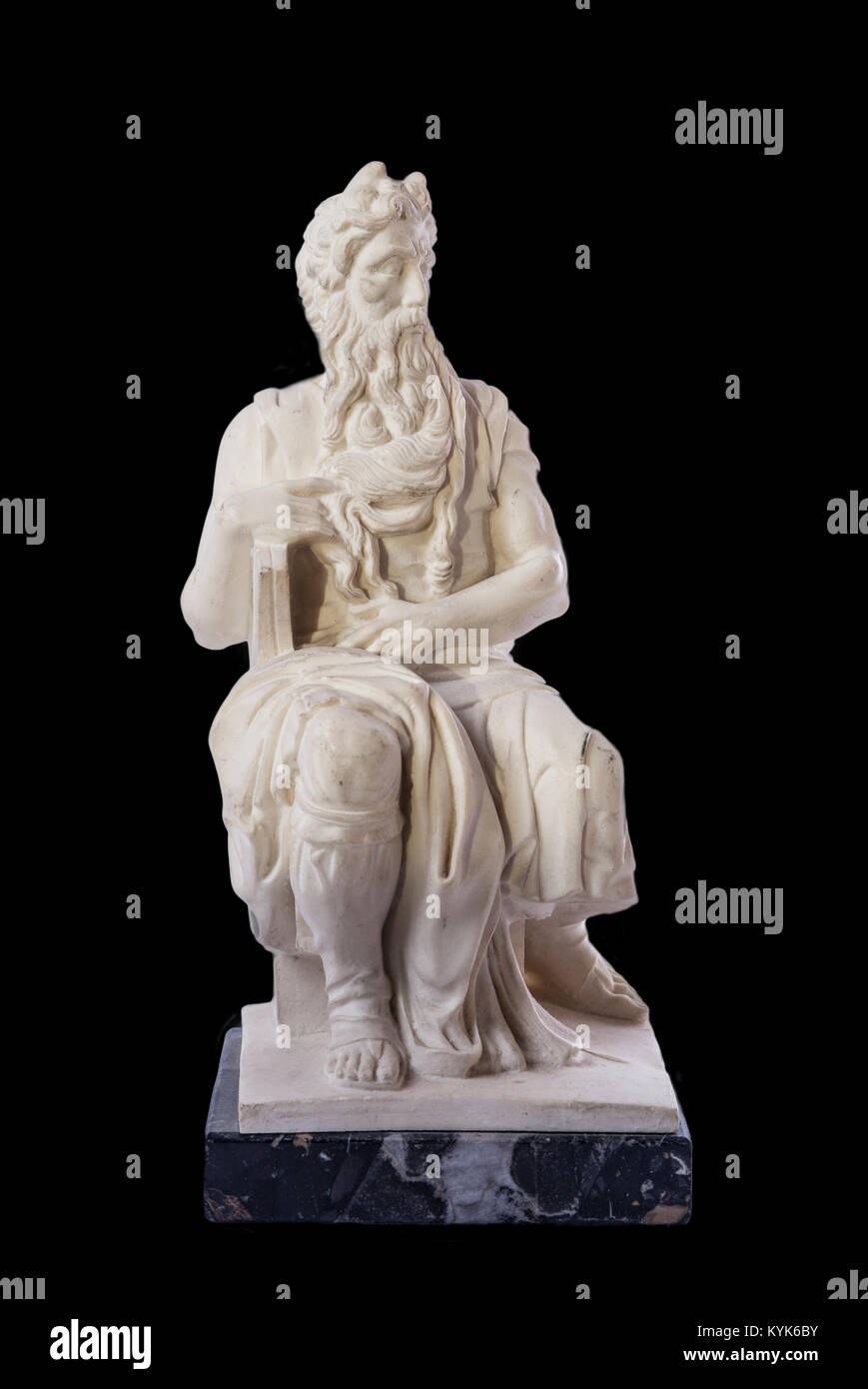 Replica of Michelangelo Moses sculpture, very popular as Rome souvenir. Isolated over black background Stock Photo