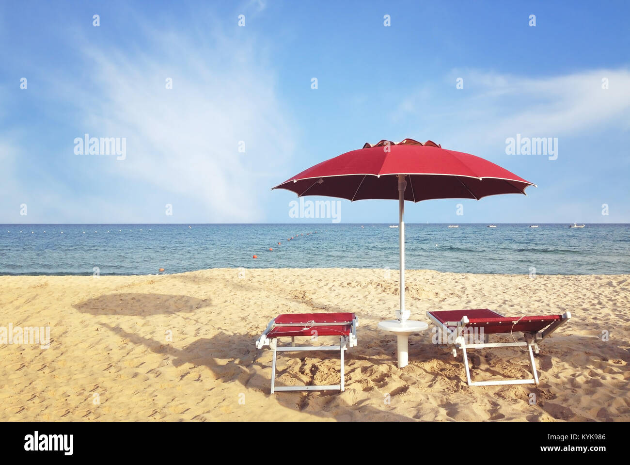 beach holidays in Italy, mediterranean sea coast in Sardinia Stock Photo