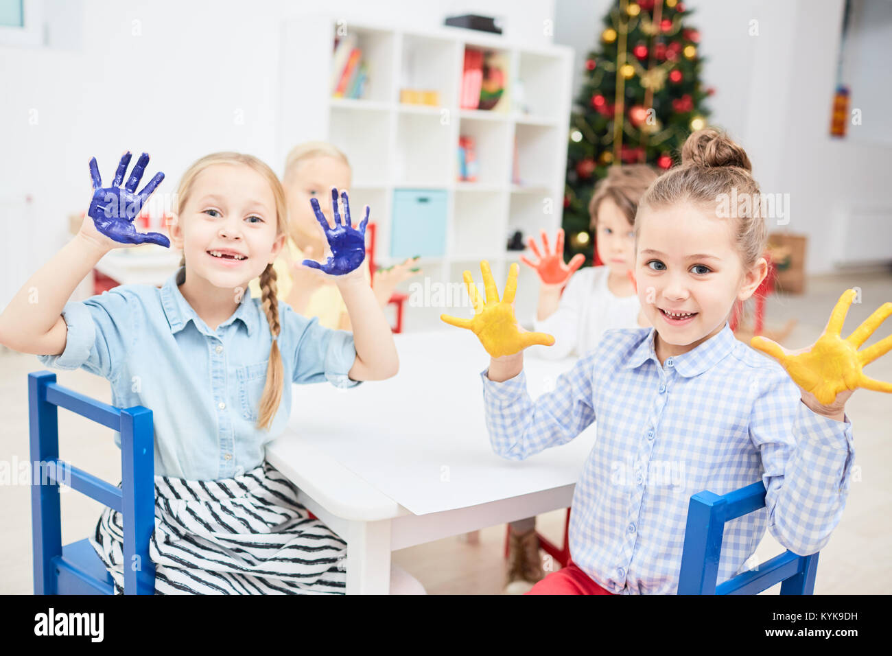 Children playing paint together hi-res stock photography and images - Alamy