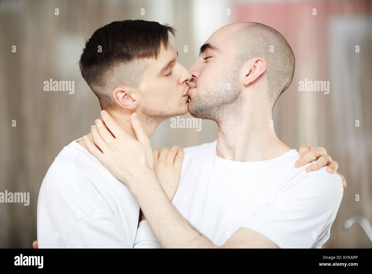 Kiss of men Stock Photo
