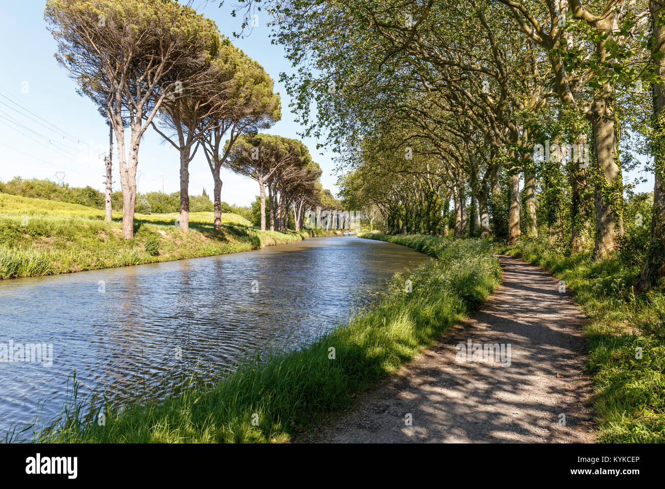 Canal du Midi. The canal  is still in good working order and now supports a busy tourist boating operation. Stock Photo