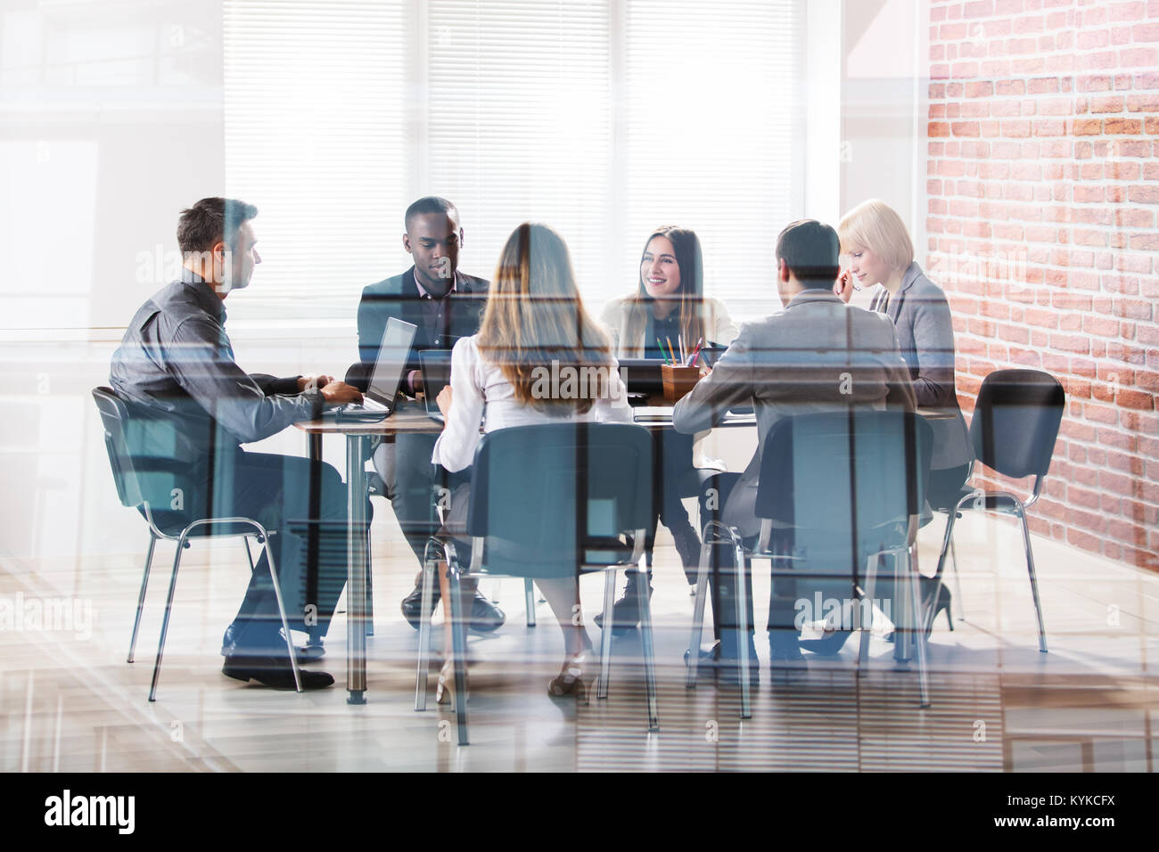 Diverse Group Of Businesspeople At Workplace In Office Stock Photo - Alamy