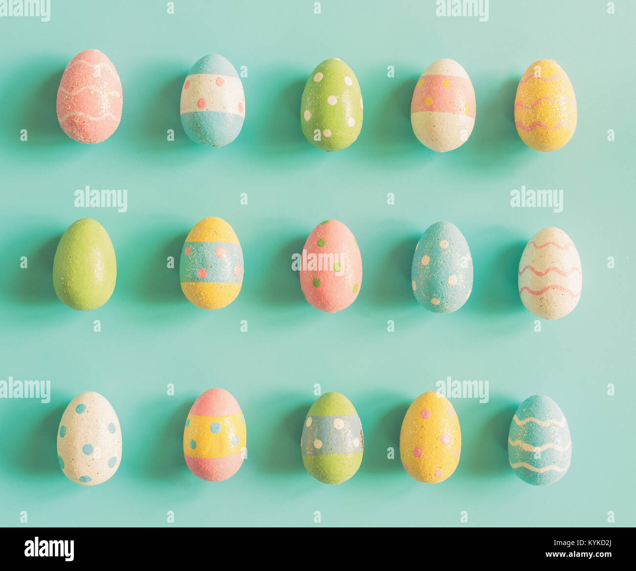 Coloeful easter eggs on pastel color background with space Stock Photo ...