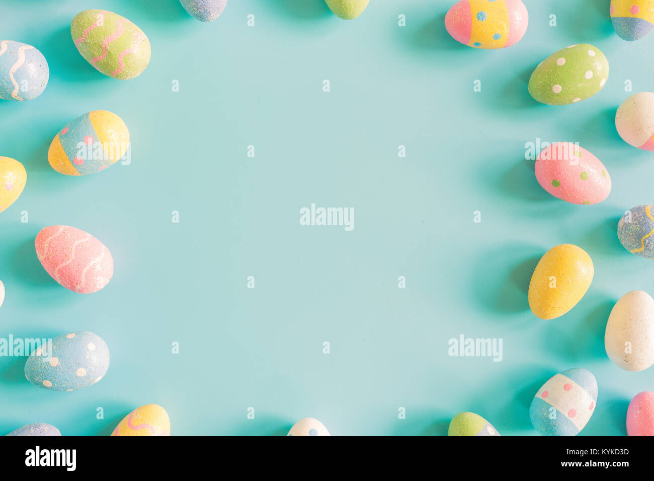 Coloeful easter eggs on pastel color background with space Stock Photo ...