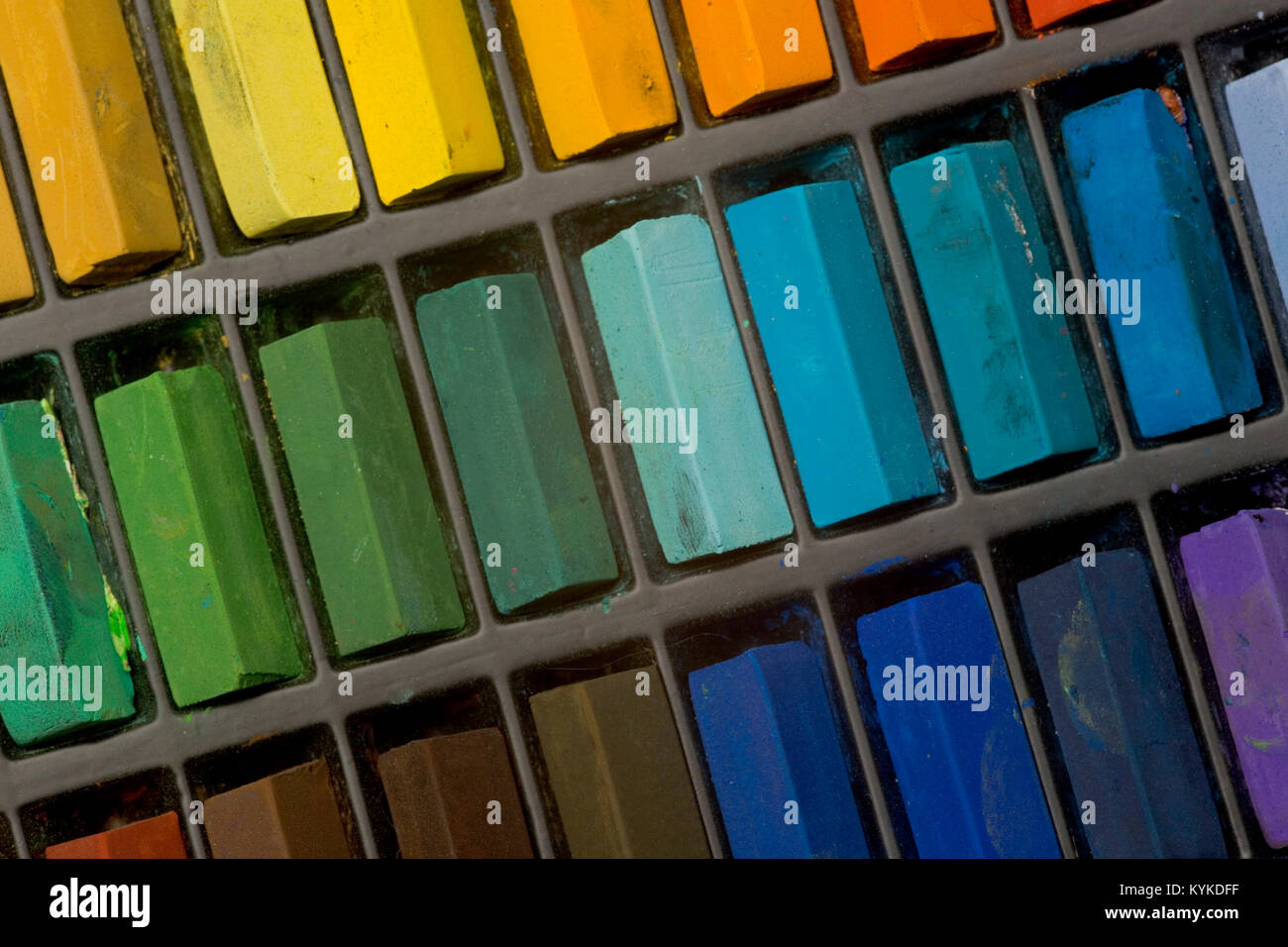 Multi coloured artists pastel crayons pattern close up Stock Photo Alamy