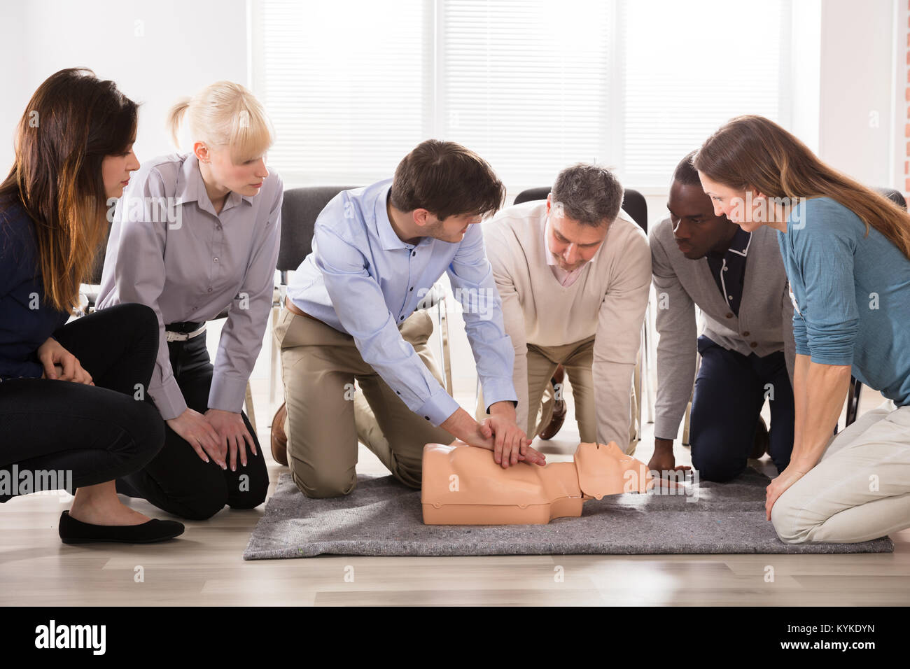 The Students Are Looking At The Instructor Performing Resuscitation ...
