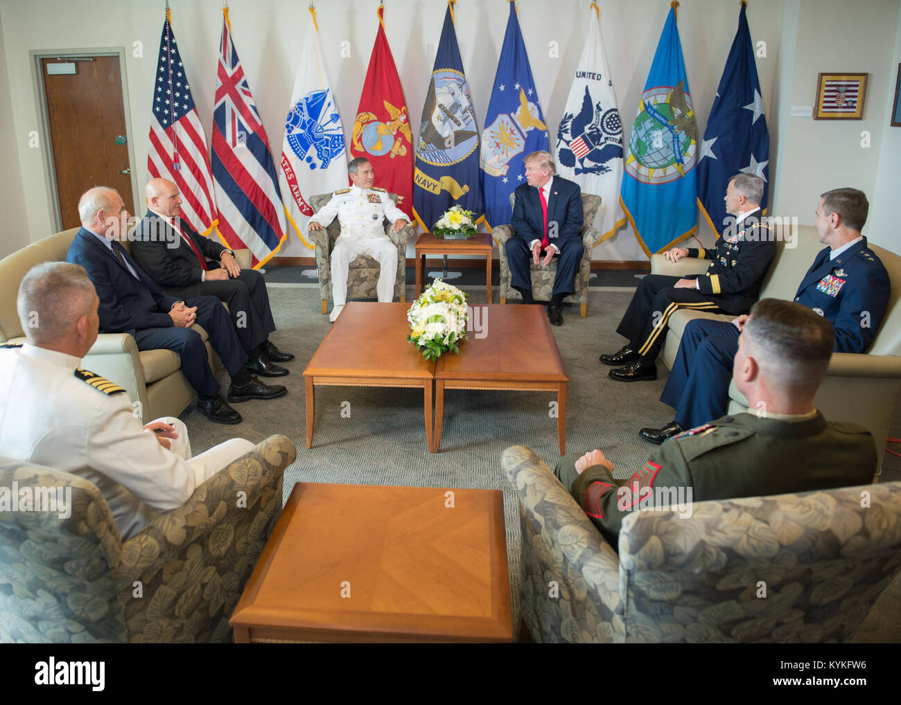 171103-N-WY954-092  CAMP H.M. SMITH, Hawaii (Nov. 3, 2017)Ñ President Donald J. Trump and U.S. Pacific Command (USPACOM) Commander, Adm. Harry Harris, sit down for a meeting at USPACOM headquarters.  The President is in Hawaii to receive a briefing from USPACOM prior to traveling to Japan, the Republic of Korea, China, Vietnam and the Philippines from November 3-14. During the trip the President will underscore his commitment to longstanding U.S. alliances and partnerships, and reaffirm U.S. leadership in promoting a free and open Indo-Asia-Pacific region. (U.S. Navy photo by Mass Communicatio Stock Photo