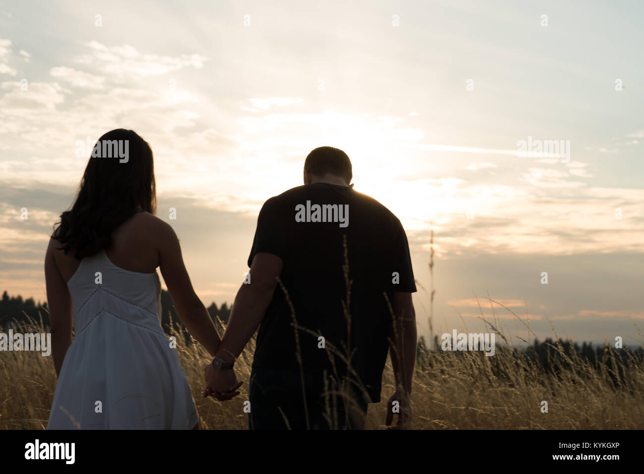 Couple Holding Hands Stock Photo