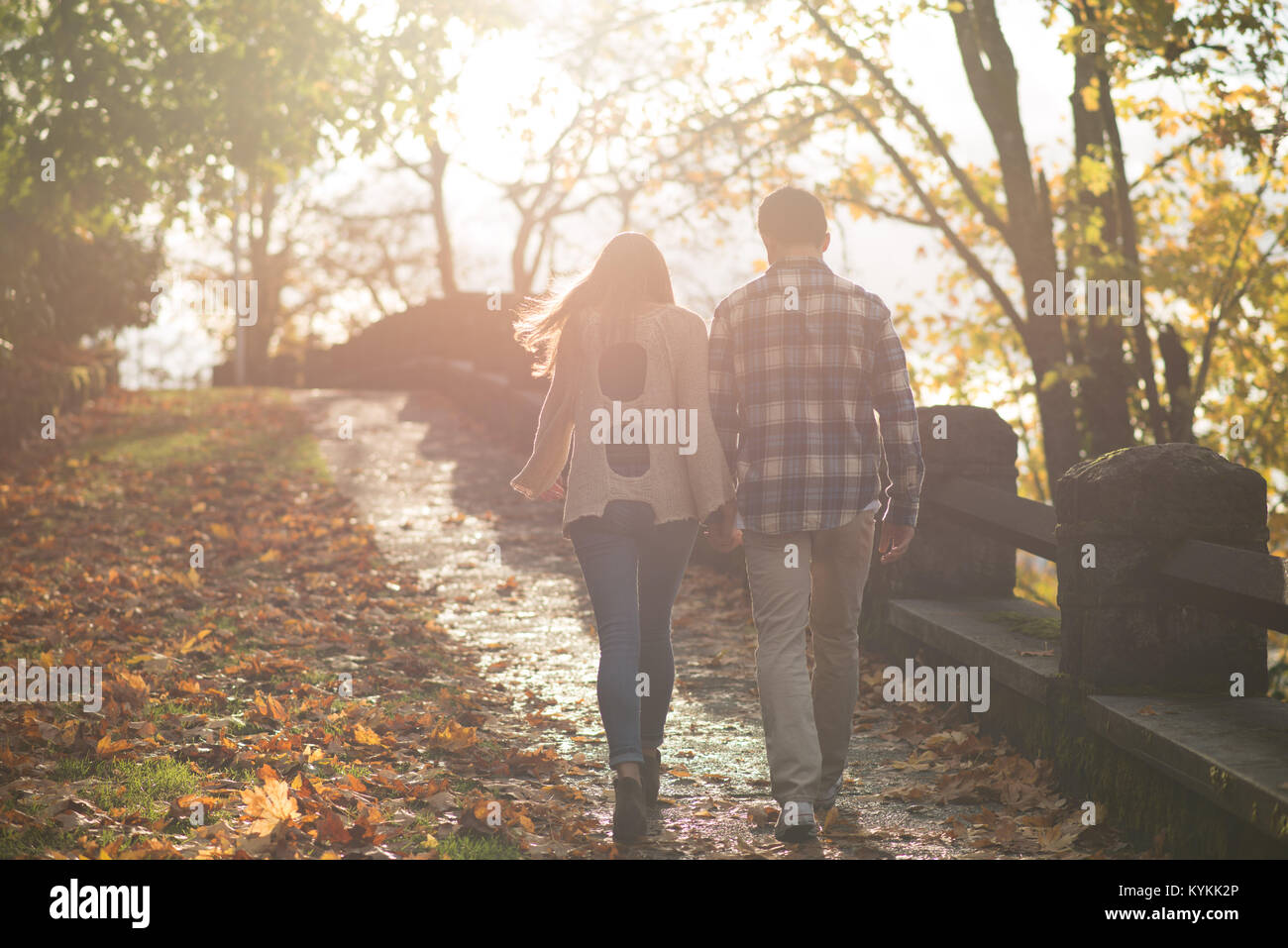 Close Up Of Couple Holding Hands Stock Photo