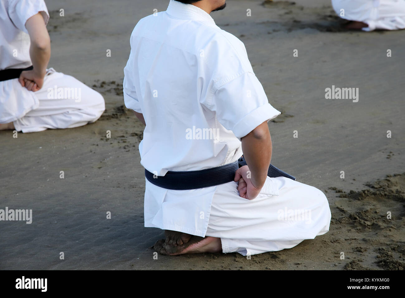 Japanese karate martial arts, spiritual sitting at the beach Stock Photo
