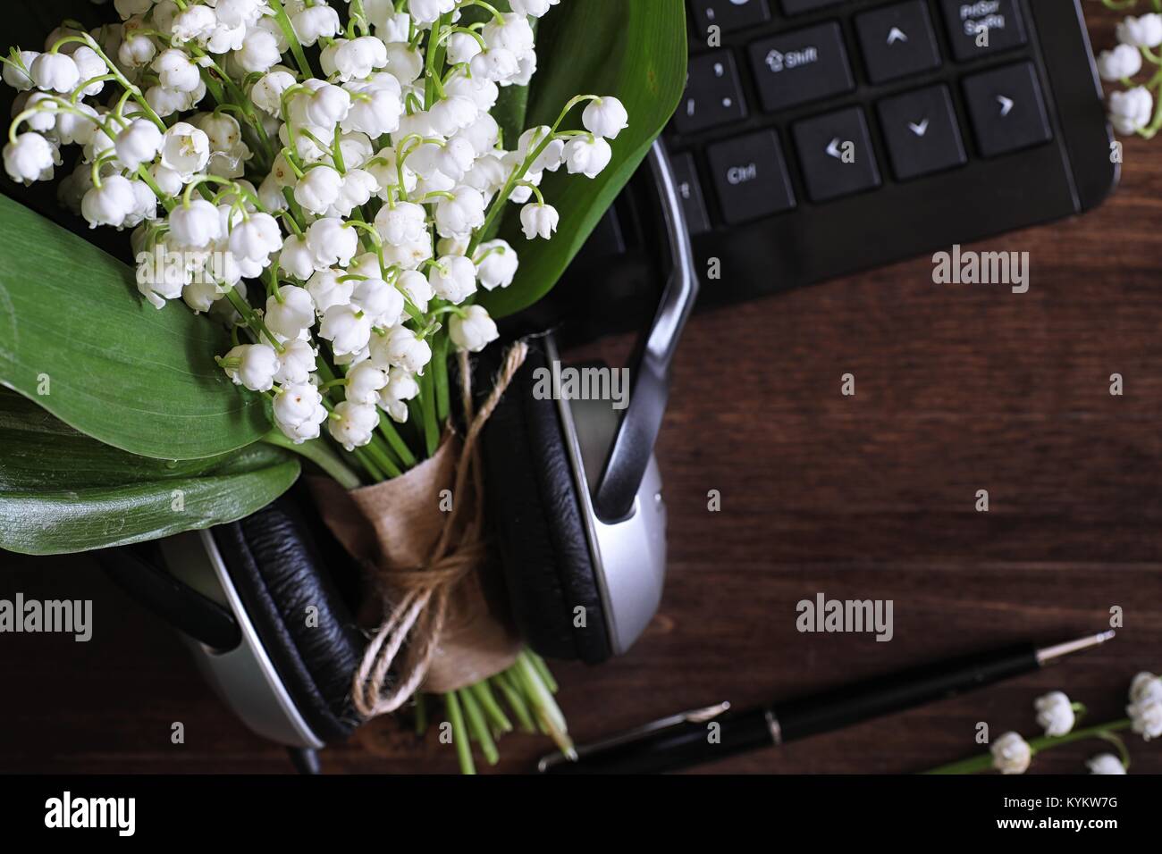 Bouquet of lilies of the valley on a table Stock Photo - Alamy