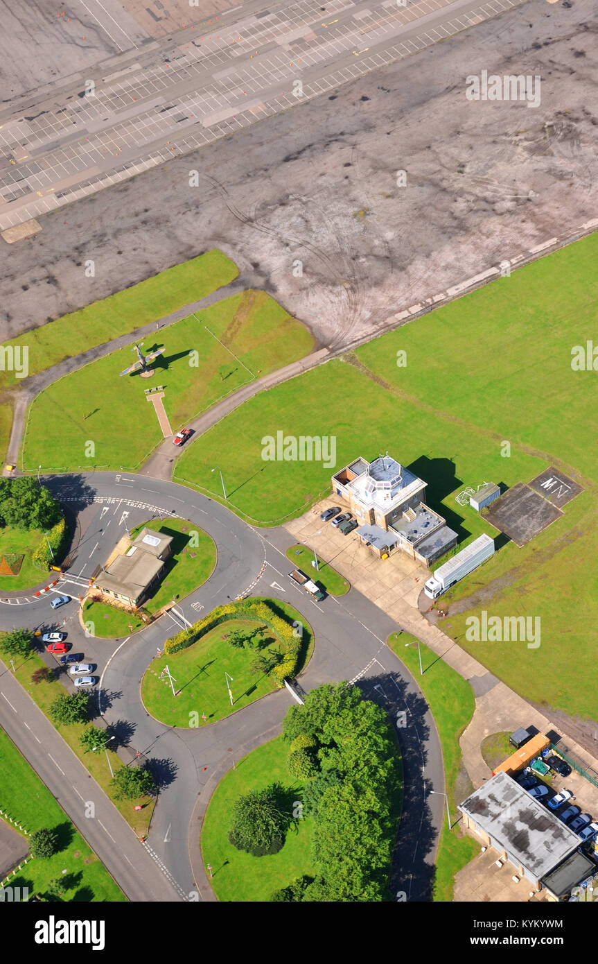 Aerial view of North Weald airfield Essex with air traffic control tower ATC and Hawker Hurricane second world war gate guardian. View from above Stock Photo