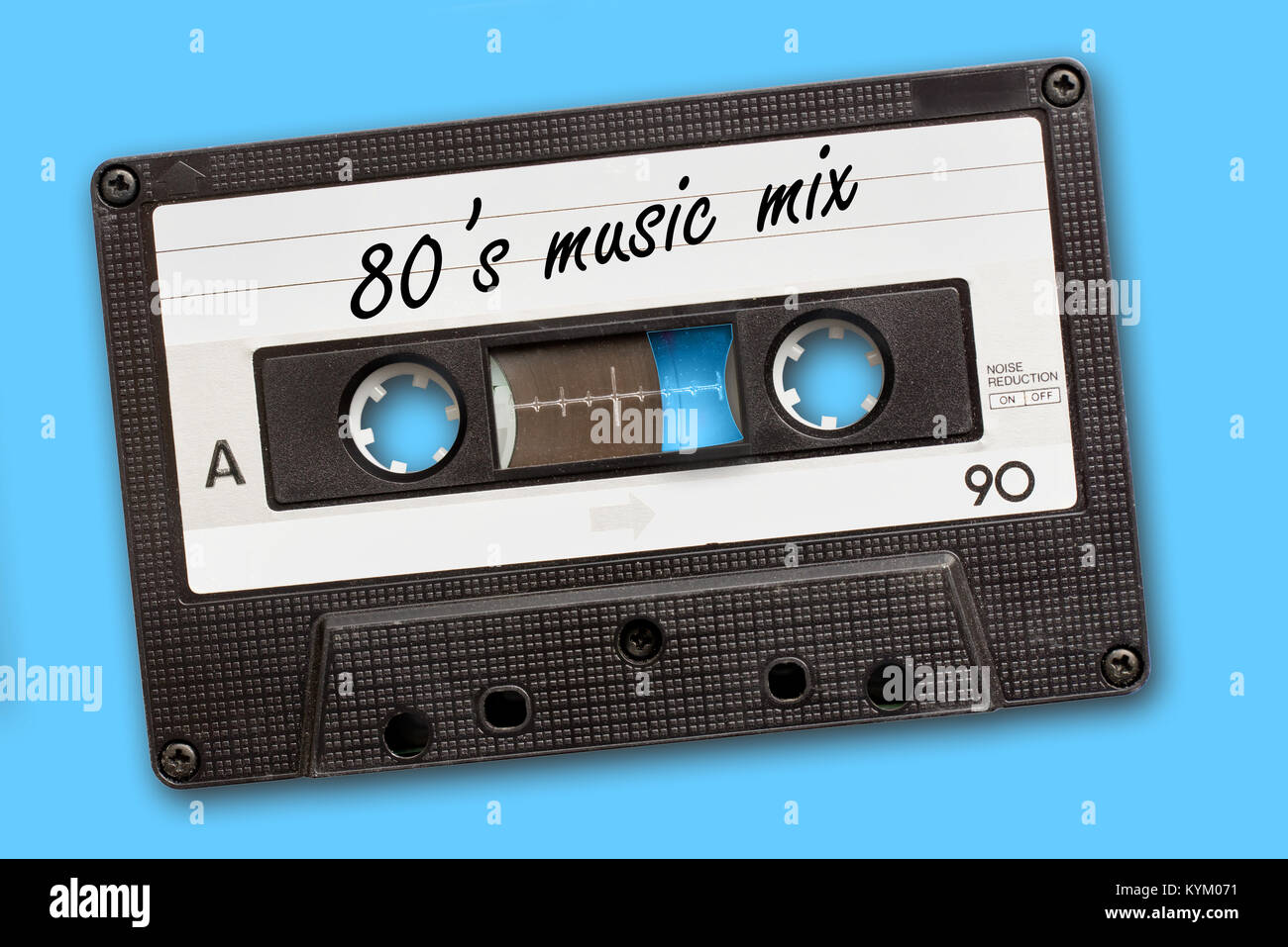 80's music mix written on vintage audio cassette tape, blue background Stock Photo