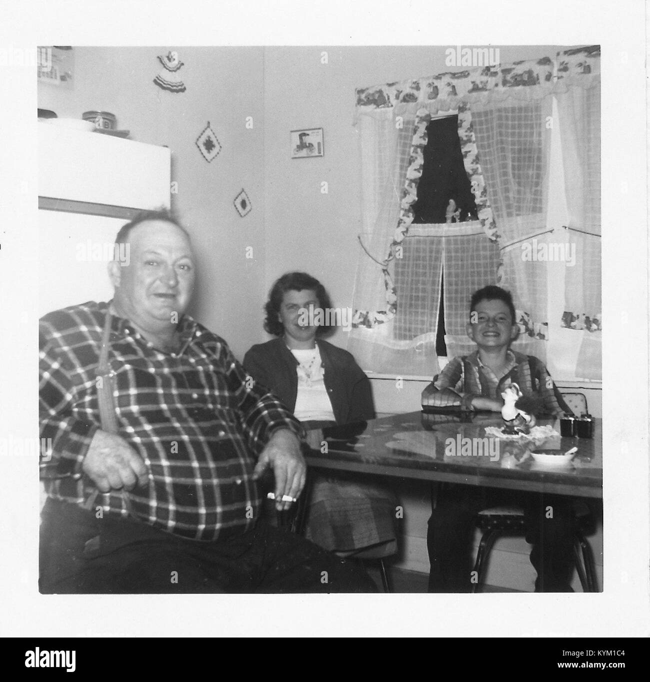 A photograph from 1961 showing Dorothy and Elburn Jr. at the Keith's, capturing a moment in the family's life during this time period. Stock Photo