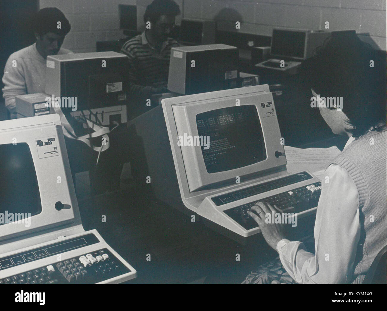 A historical photograph of computers and word processors at NIHE ...