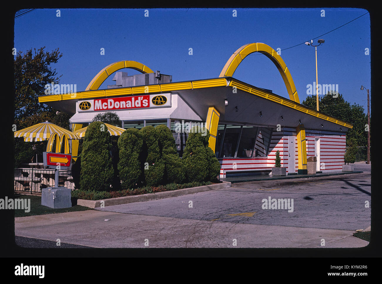 A historic photo of a McDonald's restaurant located along Route 11 in Birmingham, Alabama, showcasing a typical mid-20th-century American fast food establishment, with classic signage and design. Stock Photo