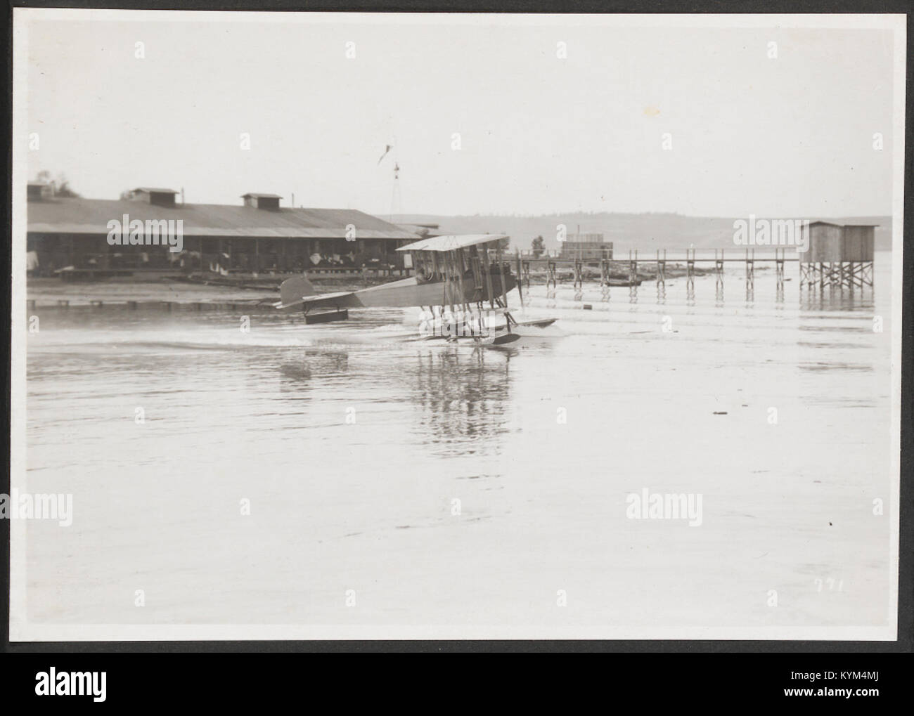 An image of a floatplane on water, part of the early aviation era ...