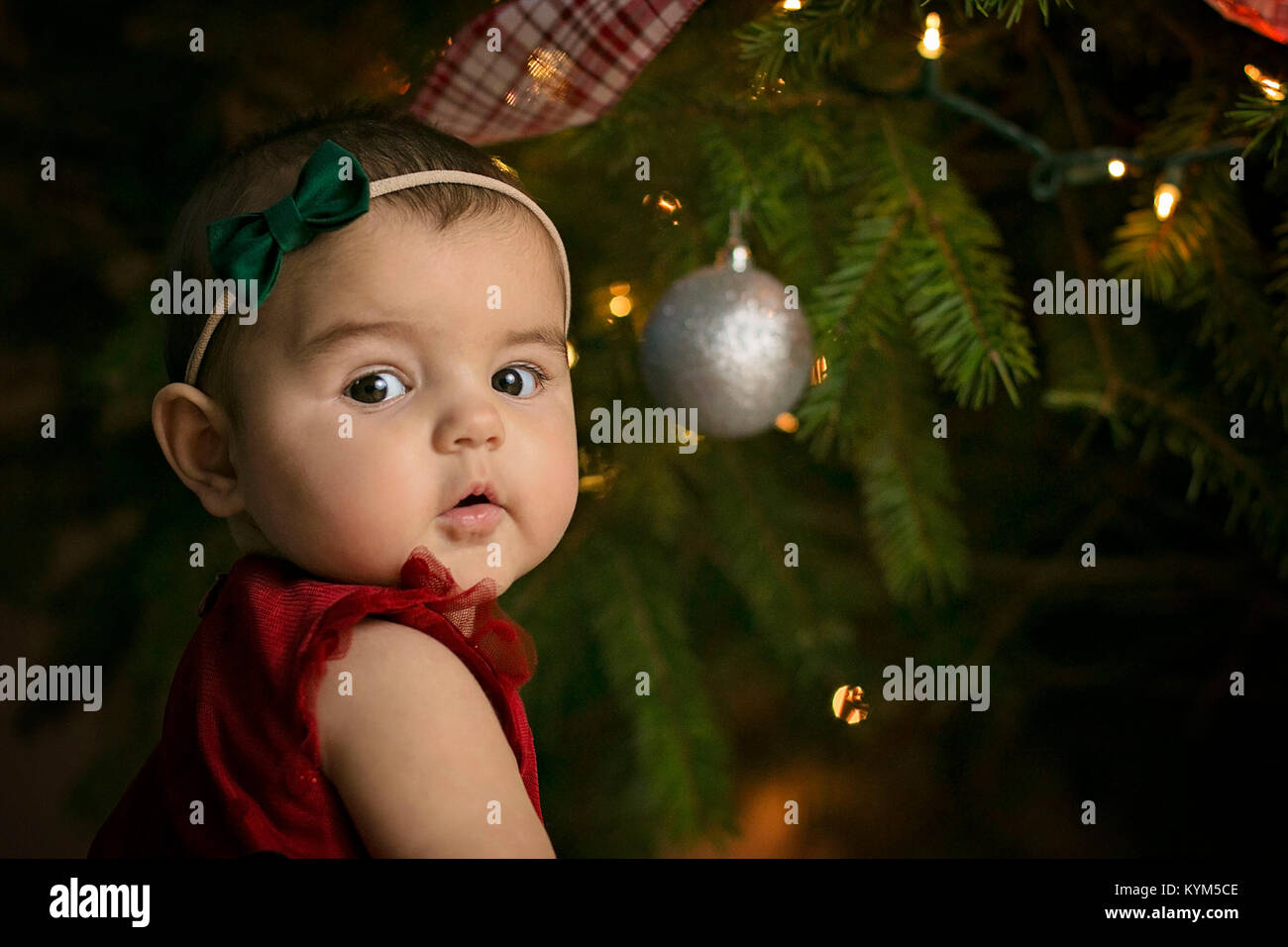 Baby girl at Christmas time Stock Photo