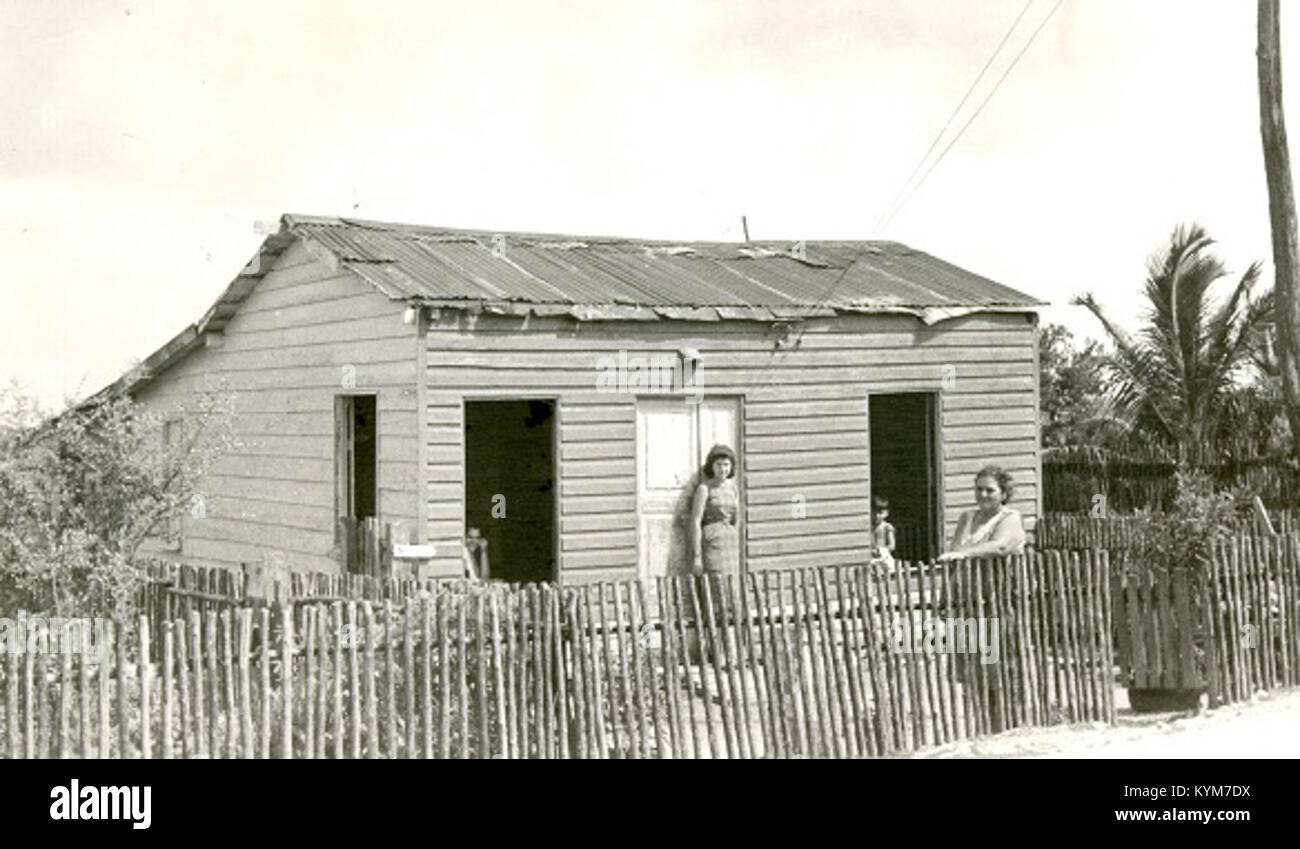 A photograph of a traditional home in La Isabela, Cuba, depicting rural ...