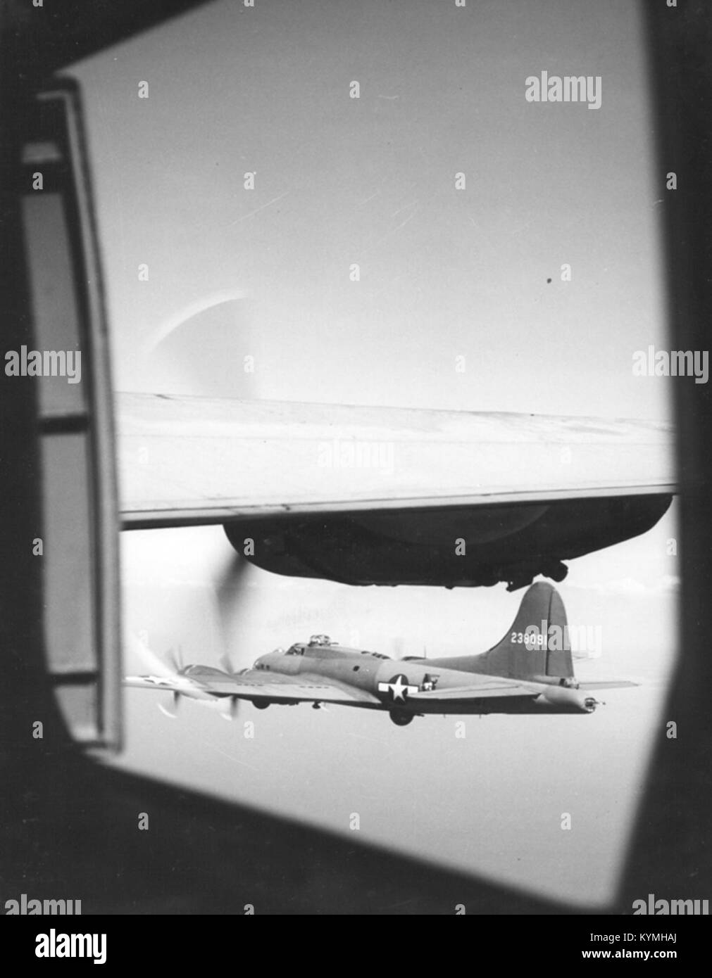 A historic photograph of the Boeing B-17 Flying Fortress, a U.S. military bomber during World War II, showcasing its design and capabilities in flight. Stock Photo