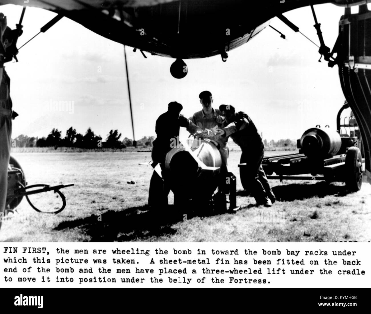 A photograph of a Boeing B-17 Flying Fortress, a U.S. military bomber used during World War II. The image showcases the aircraft in flight, highlighting its distinctive features. Stock Photo