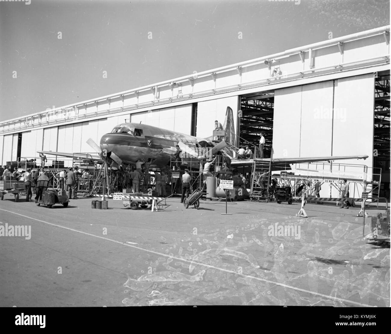 A historical image showing a Convair aircraft, likely a Convair 240 or 340, a twin-engine propeller-driven airliner used in the 1940s and 1950s. The photo provides a glimpse into the aviation technology of the time. Stock Photo