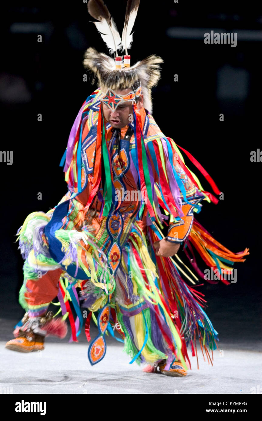 A vibrant depiction of a Native American Powwow held in 2005, showing a ...