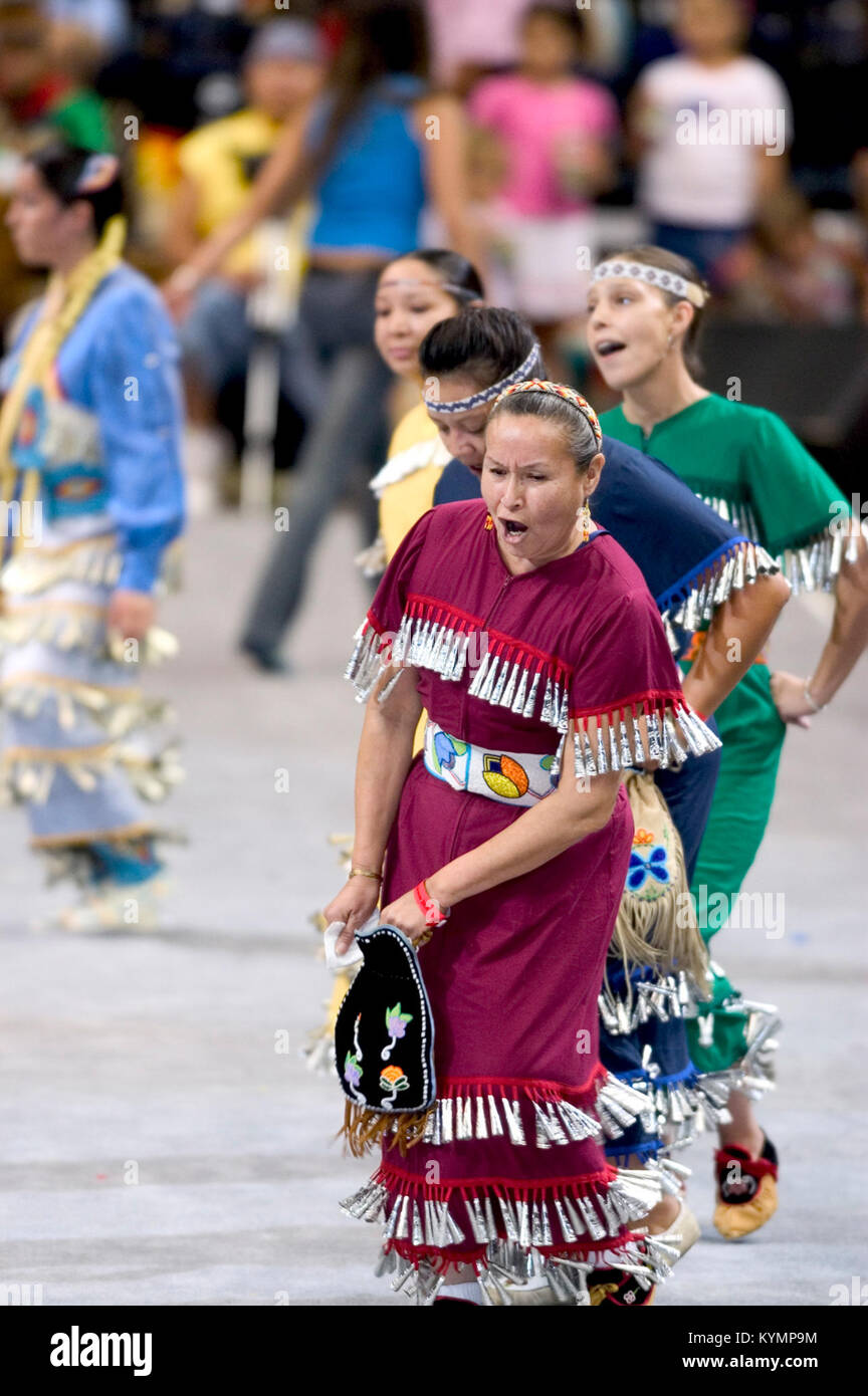 A vibrant photograph capturing Native American children and women ...