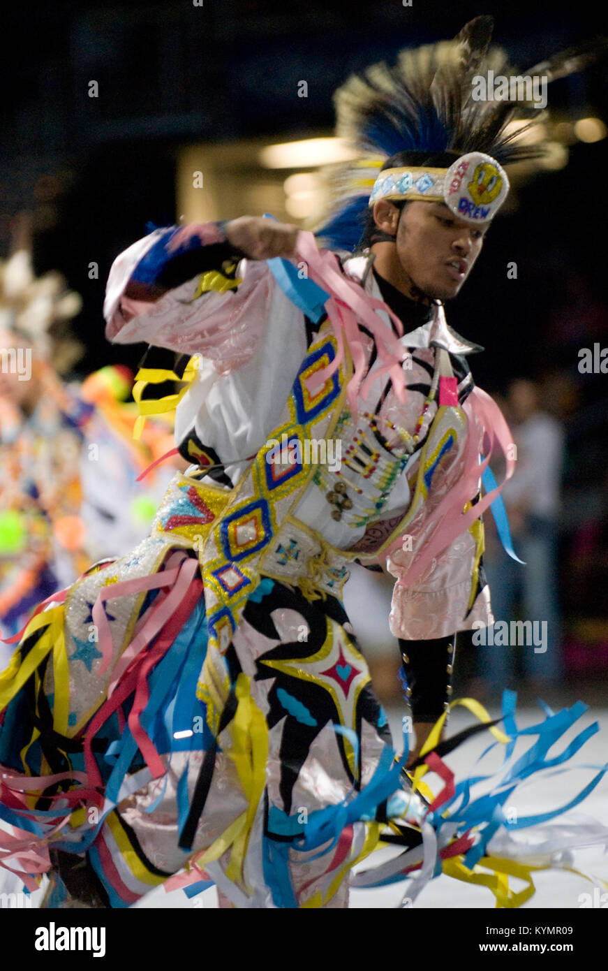 A colorful photograph from a Native American powwow in 2007, showing a ...
