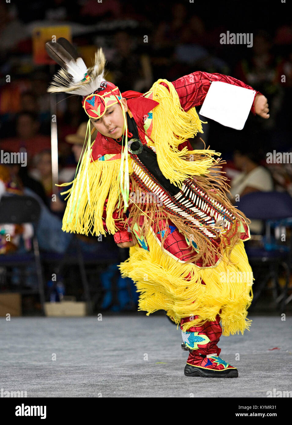 A participant dancing at the 2007 Powwow, wearing traditional Native ...
