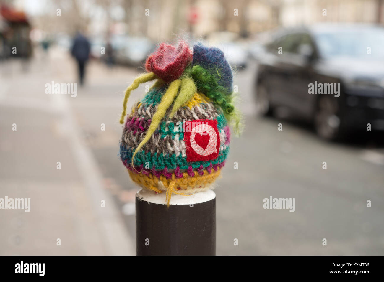 Knitted top of a bollard in Paris, France Stock Photo